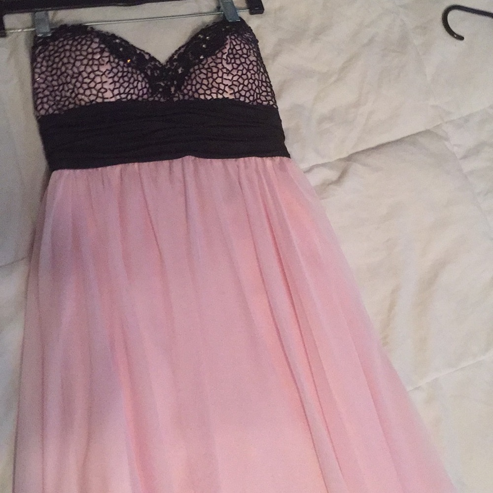 Pink prom dress from “Peaches” boutique